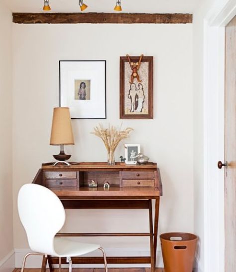 In the office nook a curvy contemporary chair highlights the rich finish and strong angles of the secretary (a Craigslist find). "I used an old wooden chair at first, but they just blended together," Sisse says. Office Eclectic, Small Secretary Desk, Eclectic Room, Wood Beam Ceiling, Bungalow Style, Secretary Desks, Wall Garden, Beautiful Spaces, Small Desk