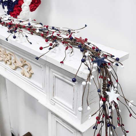 PRICES MAY VARY. Package Includes: 1 x Independence Day Berry Garland & 1 x 4th of July Feathers Garland. Each length is 6 feet/1.8 meters Flexible and Free Bending: The iron wire used to create the Pip Berry Garland branches is flexible and can be freely bent to accommodate various décor scenarios. Red, White, and Blue Elegance: Adorned with a vibrant combination of red, white, and blue elements, Independence Garland captures the spirit of America in every detail. The classic colors symbolize u Fourth Of July Mantle Decor Mantel Ideas, 4th Of July Garland, Patriotic Bunting On House, Patriotic Bead Garland, Pottery Barn 4th Of July Decor, Pip Berry Garland, Patriotic Garland, Feather Garland, Small Gathering