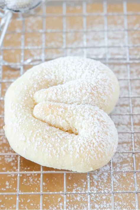 Kringla is a soft, cake-like traditional Scandinavian cookie that is slightly sweet, with a hint of almond flavor. Kringla Cookies, Kringla Recipe, Molded Cookies, Buttery Sugar Cookies, Pretzel Shape, Pretzel Cookies, Soft Cake, Rolled Sugar Cookies, Shaped Cookies