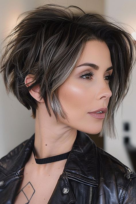 Medium-length asymmetrical layered bob with balayage highlights. Shaggy Asymmetrical Bob, Cami Cut Hair, Chin Length Stacked Bob, Trendy Pixie Haircut 2024, Asymetrical Haircut Edgy, Bob Back View, Disconnected Layers, Long Asymmetrical Haircut, Asymetrical Haircut