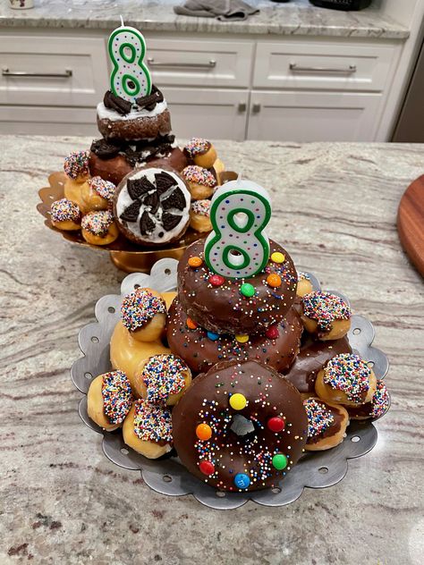 Doughnut Cakes Birthday, Donut Display Birthday, Doughnut Birthday Cake Ideas, Doughnut Cake Ideas, Birthday Donuts Ideas Boy, Doughnut Cake Tower, Donut Stack Cake, Donuts Cake Birthday, Birthday Donuts Ideas