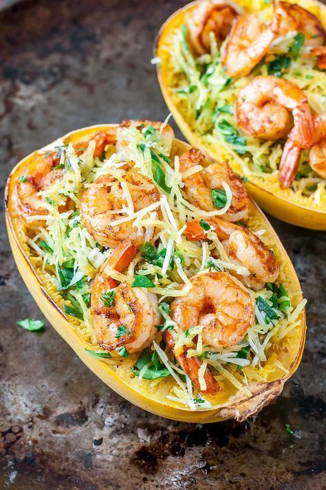 Serve up dinner for two in style with this Pesto Parmesan Spaghetti Squash with Shrimp! Tender strands of squash tossed with spinach, pesto, and parmesan, then topped with the most delicious seasoned shrimp. Spaghetti Squash With Shrimp, Spaghetti Squash Shrimp, Pesto Spaghetti Squash, Parmesan Spaghetti Squash, Pesto Spaghetti, Parmesan Spaghetti, Best Spaghetti, Spaghetti Squash Recipes, Yellow Squash