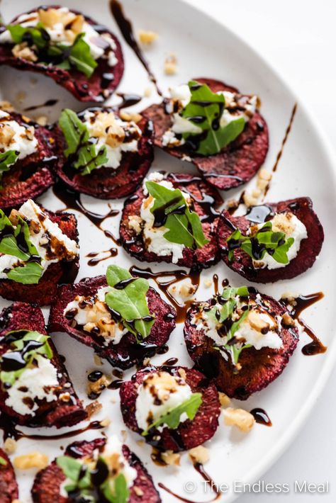 Here's a simple beet appetizer for all our last-minute entertainers. Crispy beet chips are topped with creamy goat cheese, walnuts, and arugula, then drizzled with balsamic glaze. It's easy to make, uses just 5 ingredients, and is ready in 10 minutes! #theendlessmeal #beetappetizer #goatcheeseappetizer #appetizer #goatcheese#beets #beetchips #nyeappetizer #nye #christmas #christmasappetizer #partyappetizer #partyfood Beet Appetizer, Nye Appetizers, Guacamole Bites, Roasted Beet Hummus, Beet Chips, Goat Cheese Appetizer, Beet And Goat Cheese, Roasted Beet Salad, Beet Hummus