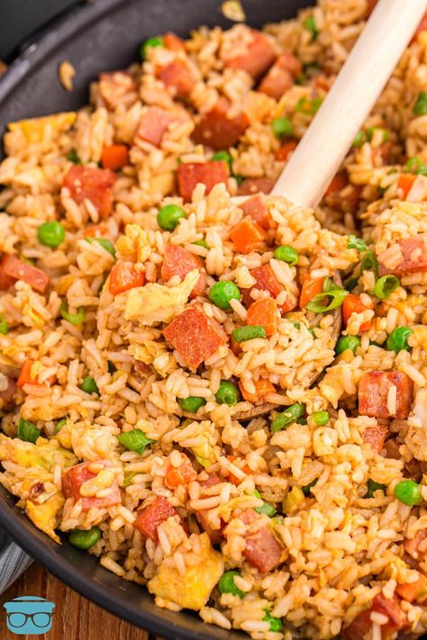 A spoon in a skillet of Spam Fried Rice. Spicy Spam Recipes, Spam Meals, Korean Buffet, Hawaiian Fried Rice, Fried Spam, Hibachi Fried Rice, Spam Fried Rice, Ham Fried Rice, Rice Dishes Recipes