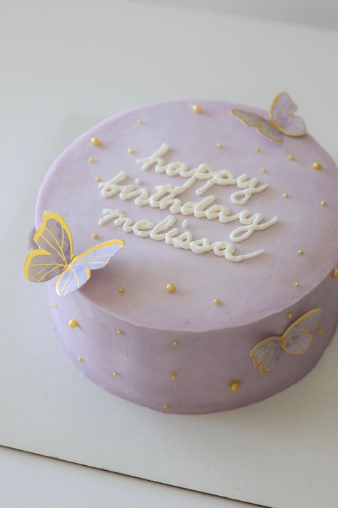 Lavender buttercream cake with gold Pearl sprinkles and paper butterflies. Very Simple Birthday Cake, Mini Butterfly Cake, Simple Butterfly Cake Designs, Butterfly Cake Ideas Birthdays Simple, Butterfly Bento Cake, Simple Pastel Cake, Simple Cute Birthday Cakes, Cute Purple Cake, Simple Butterfly Cake