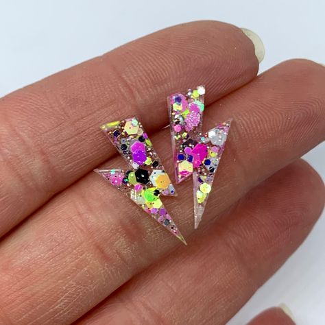 Customer reqest resin glitter lightening bolts Neon Lightening Bolt, Resin Studs, Large Dangle Earrings, Resin Glitter, Resin Jewelry Diy, Resin Jewellery, Epoxy Resin Crafts, Resin Projects, Earring Ideas