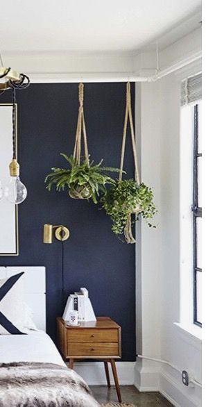 Love the hanging pot plants above the bedside table Hanging Plant By Bed, Hanging Plant Dining Room, Plants Above Headboard, Ceiling Plants Hanging Bedroom, Hanging Plants Above Bed, Bedside Plants, Hanging Bedside Table, Plants Above Bed, Hanging Bedside Lights