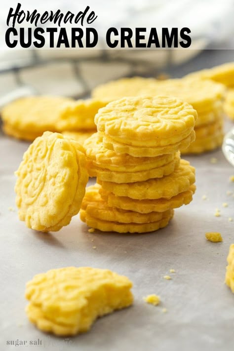 This Custard Creams recipe is a homemade version of the classic British biscuits. These delightful custard flavoured cookies are quick to make and perfect with a cuppa. #sugarsaltmagic #custardcreams #britishbiscuits #custardcookies British Biscuit Recipes, Custard Cream Recipe, Custard Powder Recipes, British Cookies, Custard Biscuits, 100 Cookies Recipe, Custard Creams, Homemade Oreo Cookies, Custard Cookies