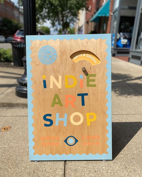 Have you seen our new sandwich board?! 😍 We are in love with this beauty! @a.n.creative came up with the design and hand-painted the sandwich board, which was fabricated by my husband, Nick. We wanted it to be fun, inviting, and cheerful, just like our shop 🙌 The spinning wheel makes it extra fun and lets us promote our artist pop-ups and live music. We think it’s just perfect and are so grateful to @americanexpress and @natlmainstreet for the Backing Small Businesses Grant that funded this ... Sandwich Board Sign, Sandwich Board, Trust In Relationships, Indie Art, Interior Display, Business Grants, Small Business Saturday, Spinning Wheel, Over The Moon