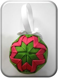 DIY Ribbon Ornament - love the bold yet pretty effect of the folded and layered grosgrain ribbon. Christmas Tree Decorations Diy Ornaments, Christmas Ribbon Crafts, Modesty Matters, Fabric Balls, Ribbon Ornaments, Quilted Ornaments, Christmas Tree Decorations Diy, Quilted Christmas Ornaments, Fabric Ornaments