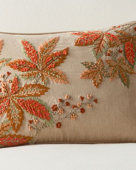 Add a little artful embroidery into the mix with this delightful pillow cover design. The intricate detail in tonal colors adds depth and dimension yet works well nestled in with other prints and patterns. Coordinates with other designs in the Botanical Embroidered Pillow Cover Collection.  Exclusive. Hidden zipper closure.  Pillow insert is sold separately. Crewel Embroidery Pillows, Quilt Cushion Covers, Christmas Decor Pillows, Embroidered Pillows Diy, Cushion Embroidery Design Ideas, Pillow Cover Embroidery Designs, Autumn Leaves Embroidery, Fall Pillows Diy, Autumn Pillows