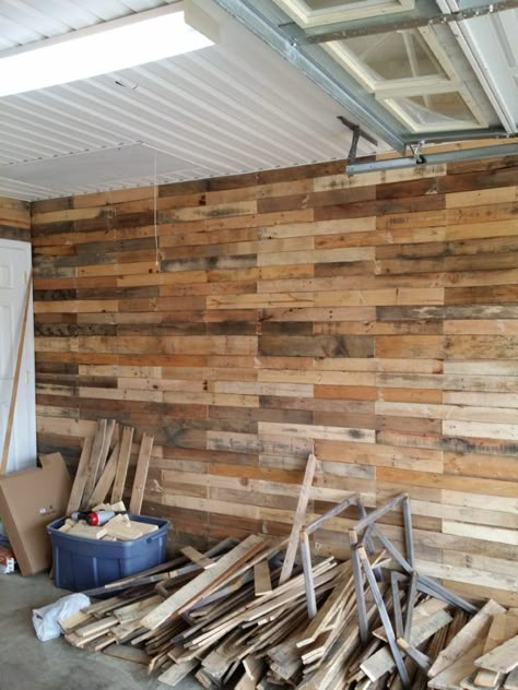 Garage Transformed Into Super Pallet Garage! Pallet Wall Decor & Pallet Painting Pallet Walls & Pallet Doors Pallet Door, Pallet Wall Decor, Garage Floor Paint, Pallet Walls, Garage Remodel, Wood Pallet Wall, Garage Conversion, Garage Interior, Garage Makeover