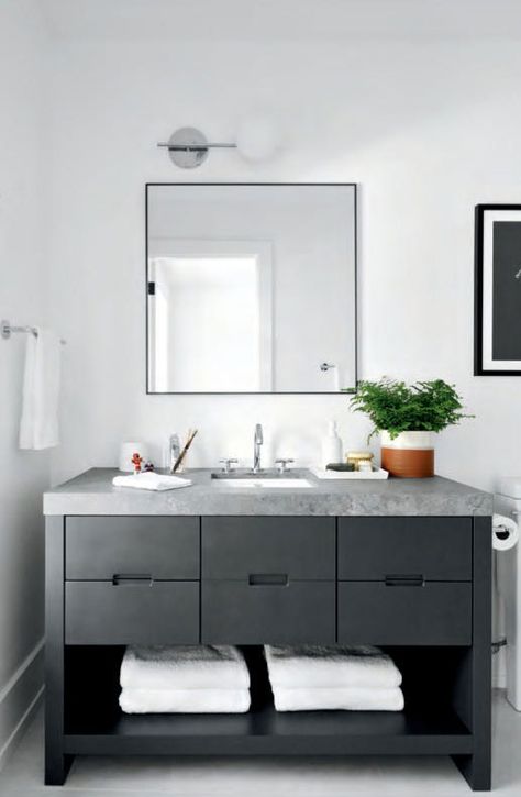 Dark grey modern bathroom vanity with grey quartz countertop Designer: Megan Crosbie Design, Photographer: Patrick Biller Grey Countertops Bathroom, Black Hardware Bathroom, Dark Modern Bathroom, Hidden Appliances, Bathroom Vanity With Drawers, White Laundry Room, Grey Quartz Countertop, Grey Granite Countertops, Grey Modern Bathrooms