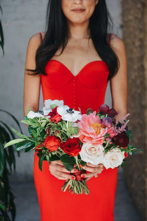 Roses and anemones made up the majority of this leafy bunch—and looked stunning against the holder's buttoned-up crimson dress. Colourful Bouquet, Anemone Bouquet, Simple Spaghetti, Red Anemone, Red Prom Dresses, Bridesmaid Bouquets, Beautiful Bouquets, Red Wedding Dresses, Prom Flowers