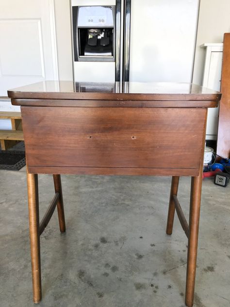 Turn an Old Sewing Table Into a Colorful Drink Station Old Sewing Machine Table, Old Sewing Tables, Sewing Table Repurpose, Diy Sewing Table, Side Table Makeover, Sewing Machine Tables, Sewing Machine Cabinet, Sewing Machine Table, Sewing Cabinet