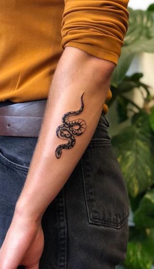 Snake Tattoo Calf, Pretty Snake Tattoos For Women, Cobra Tattoo Women, Tattoo Of Snake On Arm, Wolf Snake Tattoo, Snake Tattoo Forearm Woman, Snake Matching Tattoos, Snake Tattoo Ideas Female, Snake Elbow Tattoo