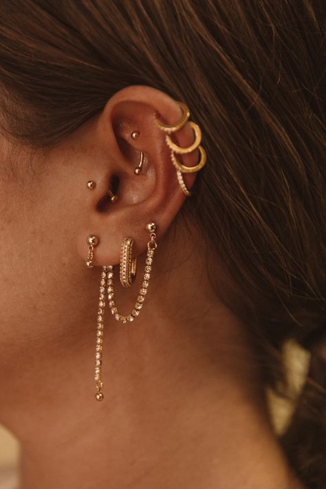 The CZ Double Drop Earring – Jay Nicole Designs A Lot Of Earrings, Piercing Designs Ear, Triple Earring Combinations, Ear Design Piercing, Cute Ear Piercings Combinations, Ear Piercing Designs, Triple Piercing Earrings, Styled Ear Piercings, Gold Earring Stack