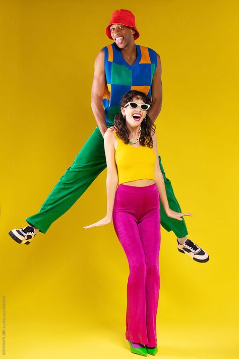 Couple In Retro Outfits Having Fun by BONNINSTUDIO Retro Couple Outfits, Outfit Couple Ideas, Couple Coordinating Outfits, Anniversary Outfits, Outfit Couple, Anniversary Outfit, Couple Ideas, Color Blocking Outfits, Orange Outfit