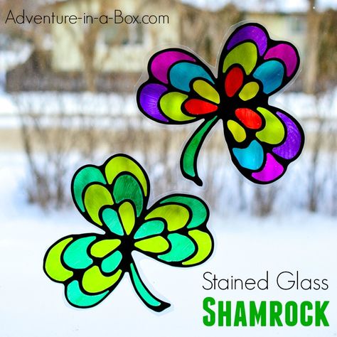 Stained Glass Shamrock Suncatcher - Adventure in a Box Shamrock Suncatcher, March Ideas, Printable Math Games, Stained Glass Cookies, March Crafts, Irish Festival, Black Glue, Pumpkin Template, Quick And Easy Crafts