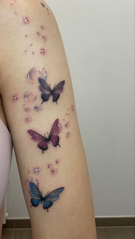 Butterfly Twinkle Tattoo, Glitter Tattoo Butterfly, Magical Butterfly Tattoo, Crystal Butterfly Tattoo, Butterflies Tattoo Arm, Butterfly With Sparkles Tattoo, Bubble Tattoo Ideas, Butterfly Arm Tattoo, Best Feminine Tattoos