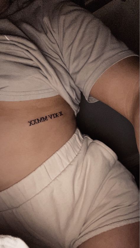 Rib Tattoo Roman Numeral, Rib Roman Numeral Tattoo, Underboob Rib Tattoo, Tattoo Roman Numeral, Roman Numeral Birthday, Under Chest Tattoo, Roman Numeral Tattoo, Numeral Tattoo, Roman Numeral Tattoos