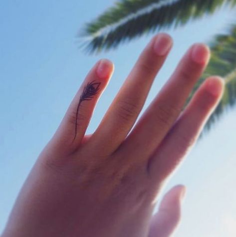 Peacock Feather Tattoo On Finger, Tattoo Ideas For Fingers, Radha Tattoo, Tattoo Krishna, Best Finger Tattoos, Diamond Finger Tattoo, Flute Tattoo, Tattoos Feather, Tiny Finger Tattoos