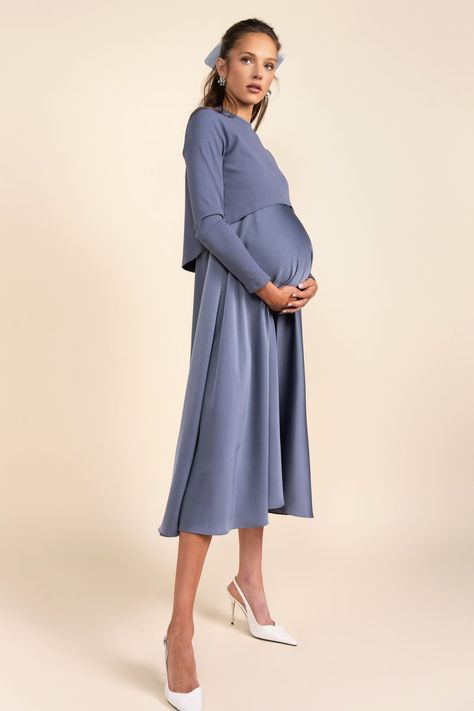 Product Details The Sahara Maternity Dress is designed for expecting mothers to feel comfortable and stylish. This sleeveless slip dress is soft and comfortable, while the flair bottom adds a touch of sophistication. Pair it perfectly with the Sahara Maternity Tee for a complete look. A must-have for any maternity wardrobe. High Waist Seam Flared Bottom Midi Length Invisible Zipper Closure in Back Model Model is 5'9" and wearing size XS Maternity Wardrobe, Maternity Tees, Pregnancy Wardrobe, Ribbed Texture, Maternity Dress, Steel Blue, Ribbed Fabric, Maternity Dresses, Invisible Zipper