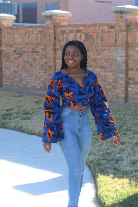 Blue and Orange Wrap Crop Top only available at Nnenaya's Fashions! Chitenge Crop Tops, Wrap Crop Top Outfit, Ankara Crop Top Styles, Ankara Wrap Top, African Print Blouse, Native Clothes, Ankara Crop Top, Choir Dresses, African Gowns