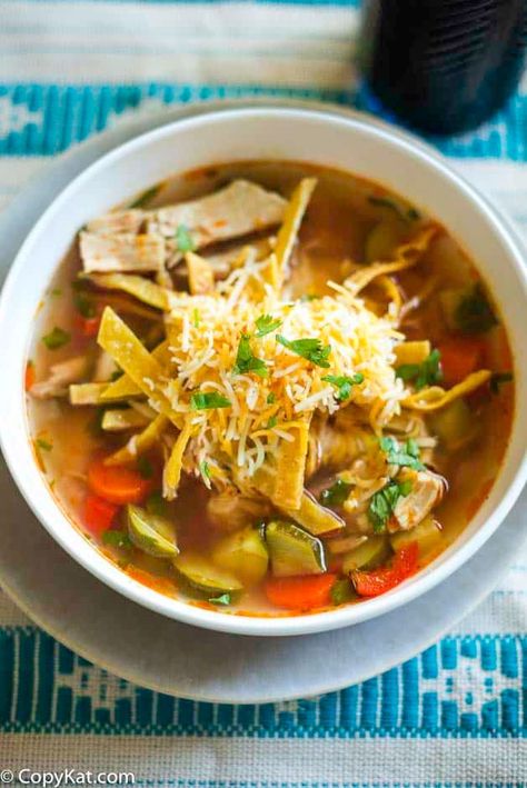 Enjoy a flavorful bowl of Chicken Tortilla Soup on a cold day. It's loaded with healthy vegetables, chile peppers, and Tex-Mex spices. Make it for dinner with this easy El Torito's copycat recipe. #souprecipe #souprecipeseasy #chickensoup #tortillasoup #copycat #copycatrecipes Tortilla Soup Easy, Creamy Chicken Tortilla Soup, Chicken Tortilla Soup Easy, Best Copycat Recipes, Chicken Tortillas Soups Recipe, Light Soups, Fried Tortillas, Tortilla Soup Recipe, Soup Easy