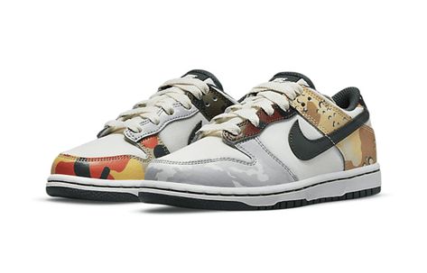 The Nike Dunk Low SE PS ‘Sail Multi-Camo’ is perfect for little ones who want a shoe that looks just like their dad��’s. With mismatched leather overlays in clashing military-inspired prints, this shoe is sure to turn heads. The dark green accents give the shoe a touch of sophistication, while the woven tongue tag and embroidered heel tabs add an extra bit of personality. Camo Dunks, Dunks Outfit, Camo Sneakers, Embroidered Heels, Dunk Low Nike, Teenage Fashion, Fall Inspo, Hype Shoes, Nike Dunk Low