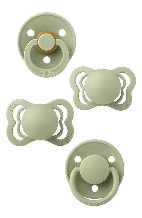 Soothe little ones with these rubber-latex pacifiers that are easy to clean and boast a modern, minimalist profile. Each set includes four distinct shapes for baby to try out. Includes four pacifiers Ages birth–18 months Rubber latex/polypropylene Spot clean Made in Denmark Cottagecore Pacifier, Baby Pacifiers, Minimalist Profile, Baby Pacifier Clip, Baby Planning, Earth Tone Colors, Baby Supplies, Green Baby, Baby Pacifier