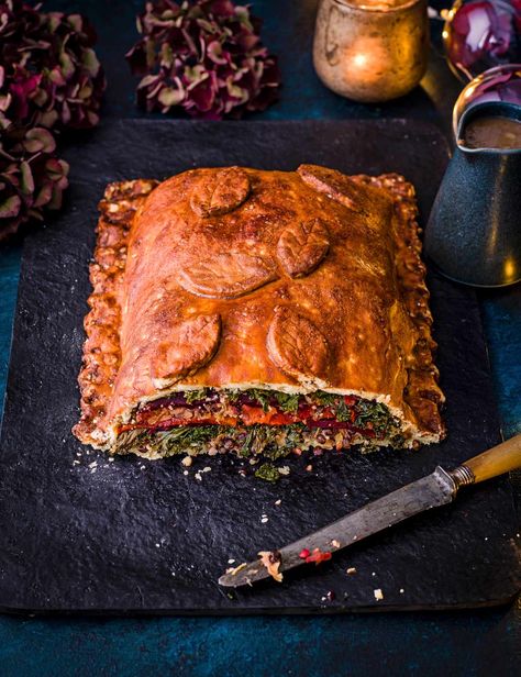 Vegan Wellington Recipe Looking for a showstopping vegan recipe? Check out our impressive vegan wellington packed with roasted red peppers, cooked beetroot and kale. Plus, we've made a vegan stuffing and glazed the pastry in marmite to take this wellington to the next level Vegetarian Wellington, Vegan Wellington, Vegetarian Christmas Dinner, Vegetarian Christmas Recipes, Vegetarian Quiche, Vegetarian Substitutes, Vegetarian Christmas, Vegan Gravy, Recipes Christmas