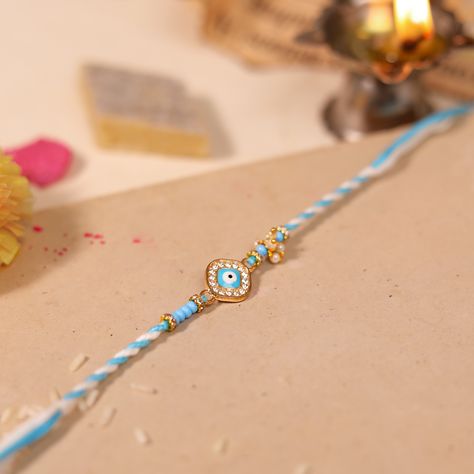 For the brother who’s always got your back, here’s an Evil Eye Rakhi to keep him safe. 💙🧿 . #ProtectiveRakhi #SiblingsForever #EvilEye #EvilEyeRakhi #Rakhi #RakshaBandhan #SiblingLove #Protection #GoodVibes #SpiritualJewelry #HandmadeRakhi #SkyBlue #WhiteAndBlue #EvilEyeBracelet #Jewelry #IndianFestival #Tradition #FestivalFashion #GoodLuckCharm #PositiveVibes #Celebrate #FestivalOfLove #IndianCulture #Blessings #LoveAndProtection #BrothersAndSisters #CulturalTraditions . [Rakshabandha, Rak... Evil Eye Rakhi, Goodluck Charms, Handmade Rakhi, Raksha Bandhan, Indian Festivals, Evil Eye Bracelet, Spiritual Jewelry, Your Back, Festival Fashion