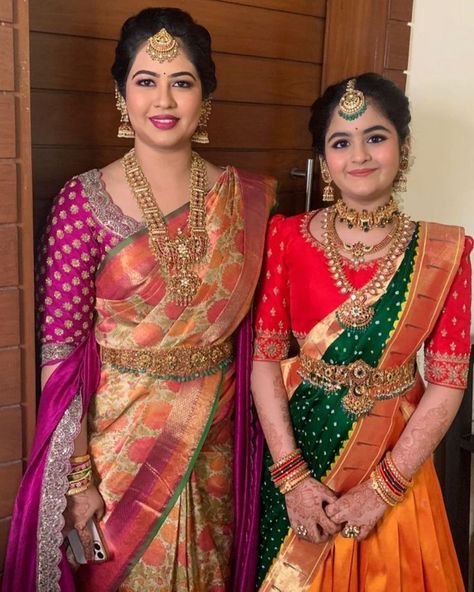 South Indian Jewels on Instagram: “Mom and daughter jewelry inspiration ❤️ Makeup @manees… | Half saree designs, Ladies blouse designs, Wedding saree blouse designs Half Saree Designs South Indian, Mom And Daughter Jewelry, Blouse Designs Wedding, Half Saree Function, Half Saree Lehenga, Instagram Mom, Wedding Saree Blouse, Kids Blouse Designs, Wedding Saree Blouse Designs