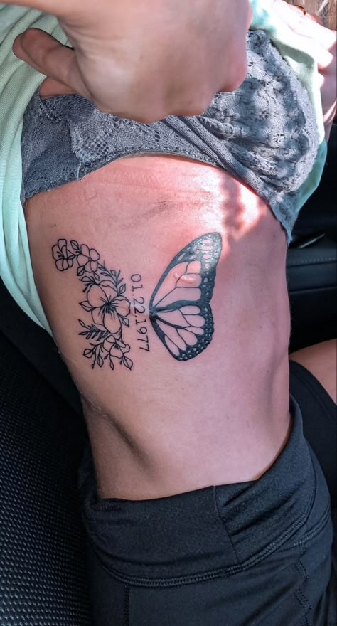 half butterfly half flowers with date in middle ⚡️ Tattoos With Hibiscus Flowers, Butterfly Tattoo Meaningful, Mid Thigh Tattoos Women, Butterfly Half Flowers, Tattoos In Other Languages, Bestie Tats, Grad Makeup, Feminine Shoulder Tattoos, Flower Tattoo On Ribs