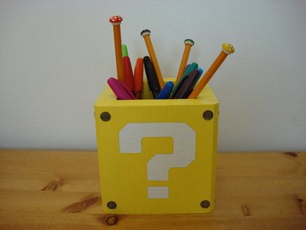 A Super Mario ? Block Pencil Holder Mario Block, Deadpool Birthday, Mario Room, Minecraft Bedroom, Geek Crafts, Nerd Geek, Kids' Bathroom, Pencil Holder, Mario Bros