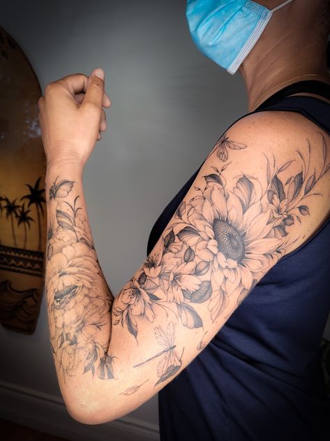 Feminine Floral Sleeve Tattoo, Sunflower Full Sleeve Tattoo, Sun Flower Sleeve Tattoo, Unique Flower Sleeve Tattoo, Fall Flower Tattoo Ideas, Sunflower Arm Tattoo Half Sleeves, Daisy Upper Arm Tattoo, Fine Line Sunflower Tattoo Sleeve, Upper Arm Sunflower Tattoo