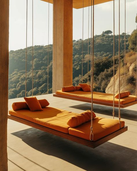 Suspended between earth and sky, these floating daybeds offer a serene retreat with breathtaking views of the rolling hills beyond. The warm, golden tones of the cushions mirror the sun-drenched landscape, creating a seamless blend between architecture and nature. Simple yet striking, the minimalist design allows the surrounding environment to take center stage, while the gentle sway of the beds invites total relaxation. This is outdoor living redefined—elevated in both style and experience. ... Between Earth And Sky, Earth And Sky, Rolling Hills, Center Stage, Breathtaking Views, Minimalist Design, Relaxation, Outdoor Living, Floating