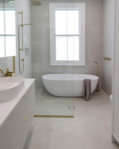 Interior Designer Auckland on Instagram: "PROJECT ARDMORE Changing the layout to a wet area meant this family bathroom could function well with space for a laundry and storage #nzinteriordesigner #nzinterior #nzvilla #nzbathroomdesign #interiordesignnz #bathroomrenovation #interiordesignernz #aucklandinteriors" Wet Area Bathroom Layout, Wet Area Bathroom, Feature Tiles, Family Bathroom, Bathroom Layout, Guest Bath, Bathroom Renovation, Auckland, Interior Designer