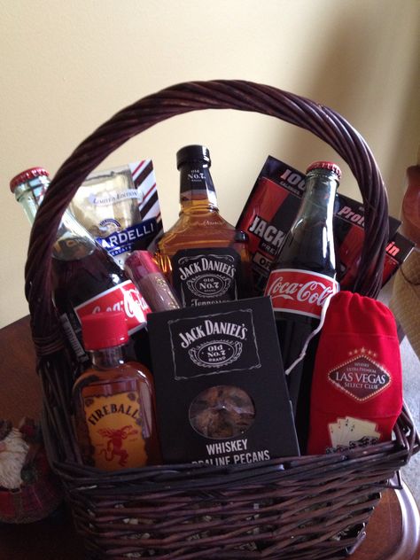 Man Basket for my Brother-in-law  Jack & Coke Whiskey Shots Cigar Beef Jerky Chocolate Nuts Whiskey Raffle Basket Ideas, Jack And Coke Gift Basket, Whiskey Basket Gift For Men, Whiskey Basket Ideas, Donation Baskets, Whiskey Gift Basket, Beef Jerky Gift, Liquor Baskets, Whiskey Gifts Basket