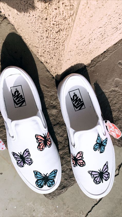 I’ve seen people paint on shoes before so I wanted to give it a try. Ordered a pair of white vans. Painted butterflies on them, using basic acrylic paint I purchased at Michael’s. Once finished, I sprayed them with an anti-stain and water resistant spray that Vans sells. Paint On Shoes, Vans Slip On Outfit, Converse 2020, Vans Wallpaper, Aesthetic Converse, Vans Shoes Fashion, Vans Painted, Vans Shoes Women, Painted Butterflies