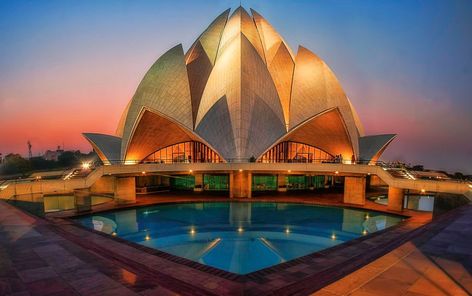 LOTUS TEMPLE Delhi, India Lotus TempleLotus Temple is one of the most picturesque temples of India. Lotus Temple stands seventh in the international chain of Bahai House of Worship. Lotus Bahai Temple is considered the Mother Temple of the Indian Continent. #indiatourism #indiatravel #indiatours #indiatrip #indiavacations #indiatourpackages #wanderlust #doyoutravel #goexplore #wonderfulplaces #lovetotravel #travellifestyle #luxuryholiday #holiday #vacations #honeymoontourpackage #tourism Balance In Architecture, Lotus Temple Delhi, Monuments Of India, Konark Sun Temple, Indian Tourism, Indian Monuments, Uttarakhand Tourism, Ram Kapoor, Yoga House