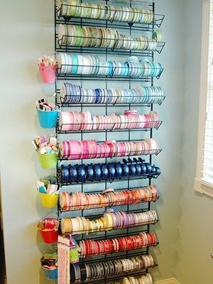 I’m refreshing up my craft room (just wait and see tomorrow’s post!) and one area that I need to make more functional for me is my ribbon storage. I have it all in a tupperware–which is fine but I would love it to be a little more accessible than me digging for a certain color! … Ribbon Holders, Ribbon Organization, Ribbon Storage, Scrapbook Storage, Scrapbook Organization, Dream Craft Room, Craft Room Design, Sewing Room Organization, Scrapbook Room