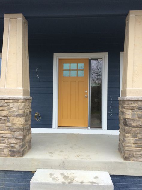 Front door is Honeycomb from Sherwin Williams. Sherwin Williams Honeycomb, Gold Front Door, Fromt Doors, Cost Of Granite Countertops, Kohler Kitchen Faucet, Exterior Paint Schemes, Door Paint, Colour Trend, Family Cabin