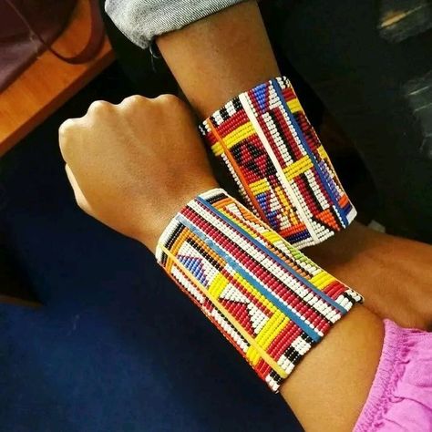 A pair of African Beaded bracelets Comes in pairs Made of beads Available for wholesale Ships from Nairobi Kenya to the rest of the world. Buy with other items and get free delivery for the other as they come together as one package. Delivery is done via DHL EXPRESS and tracking number provided. Shop link https://african1stores.etsy.com Masaai Attire, Maasai Dress, Maasai Jewelry, Masai Jewelry, African Beaded Bracelets, Hand Bracelets, Zulu Women, Pokemon Jewelry, Bracelets Christmas