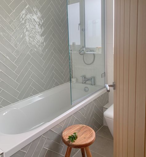 Shower Over Bath Tiles, Bathroom Tiles Small Space, Herringbone Tile Tub Surround, Tiled Bath Panel Ideas, Bath Shower Combo Ideas, Bathroom With Shower Bath, Tiled Bath Panel, Rustic Bathroom Ideas Farmhouse, Matt Preston