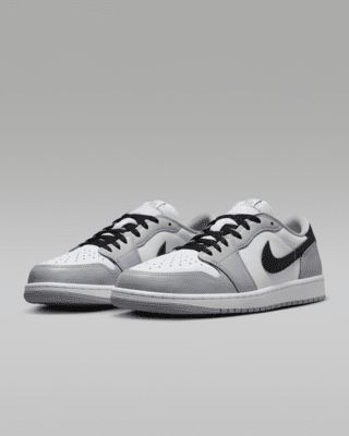 The Air Jordan 1 Low OG remakes the classic sneaker with new colors and textures. Premium materials and accents give fresh expression to an all-time favorite. Shown: White/Wolf Grey/Black Style: CZ0790-110 Jordan 1 Low Wolf Grey, Jordan 1 Low Grey, Mens Grey Shoes, Nike Air Jordan 1 Low, Grey Wolf, Grey Outfit, White Wolf, Air Jordan 1 Low, Jordan 1 Low