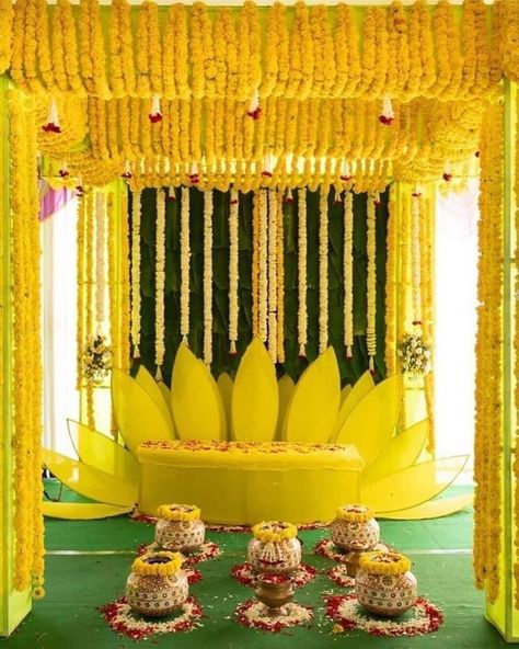 Top 20 Haldi Decor Ideas To Charm Your Haldi Ceremony Mangala Snanam Decoration For Bride, Mangalasnanam Decorations, Outdoor Haldi Decor, Half Saree Function Decoration Ideas, Mangala Snanam Decoration, Haldi Decoration Ideas Backdrops, Decoration For Haldi, Haldi Function Decoration, Mangala Snanam