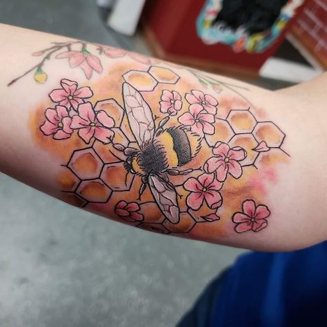 Bumblebee with flowers and a honeycomb tattoo done by EllieMacInk Honeycomb Tattoo On Neck, Honeybee And Flower Tattoo, Colorful Bee Tattoo, Bee Honeycomb Tattoo, Cute Bumblebee Tattoo, Honeycomb And Flowers Tattoo, Hibiscus And Bee Tattoo, Honeycomb Tattoo Design, Bee And Honeycomb Tattoo