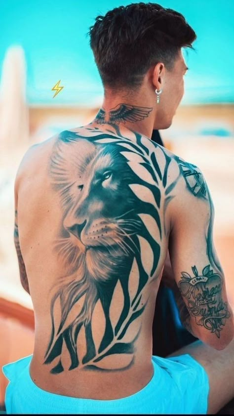 Discover the world of lion tattoos in our article. From deep symbolism and rich history to placement options and best designs. Lion Back Tattoo, First Tattoo Ideas, Lion Tattoo Sleeves, African Tattoo, Lion Head Tattoos, Dragon Sleeve Tattoos, Full Sleeve Tattoo Design, Lion Tattoo Design, Ornamental Tattoo